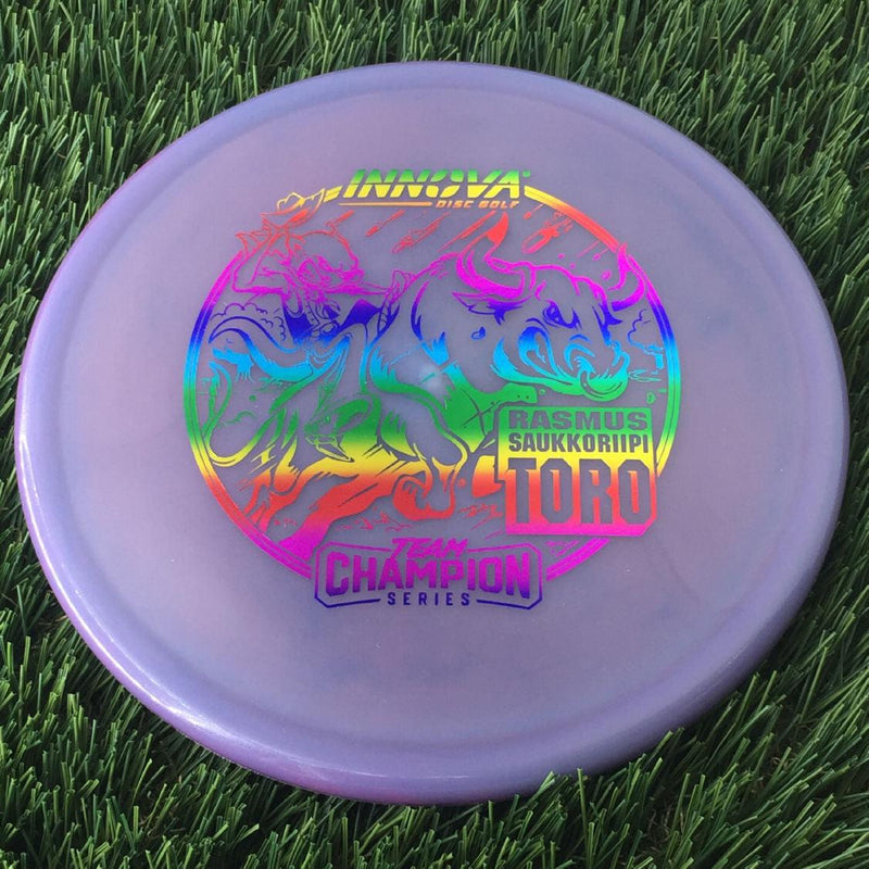 Innova Proto Glow Champion Toro with Rasmus Saukkoriipi Team Champion Series 2025 Stamp - 175g - Translucent Blurple