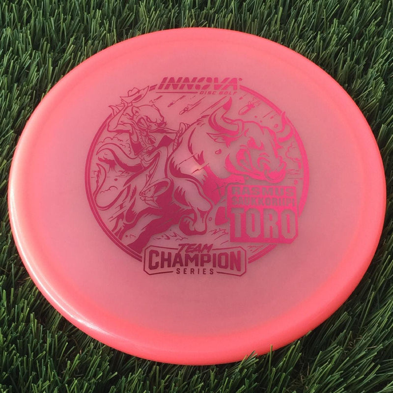 Innova Proto Glow Champion Toro with Rasmus Saukkoriipi Team Champion Series 2025 Stamp - 175g - Translucent Pink