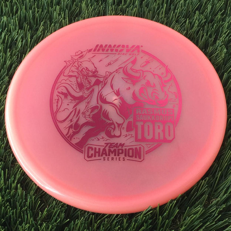 Innova Proto Glow Champion Toro with Rasmus Saukkoriipi Team Champion Series 2025 Stamp - 175g - Translucent Pink