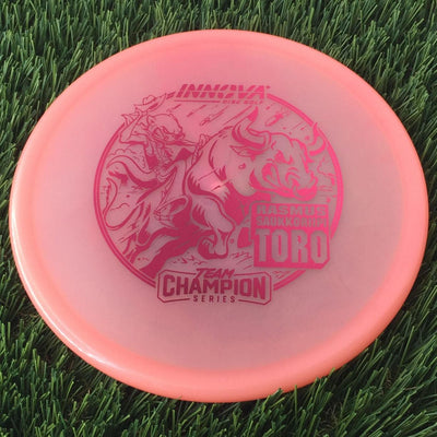 Innova Proto Glow Champion Toro with Rasmus Saukkoriipi Team Champion Series 2025 Stamp - 175g - Translucent Pink