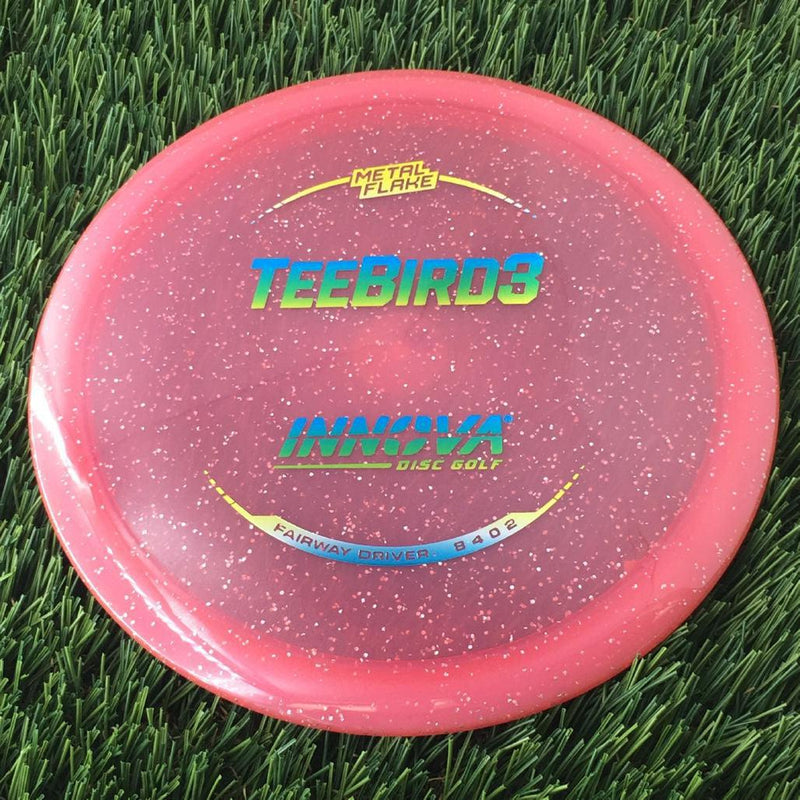 Innova Champion Metal Flake Teebird3 with Burst Logo Stock Stamp - 171g - Translucent Pink