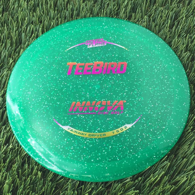 Innova Champion Metal Flake Teebird with Burst Logo Stock Stamp - 175g - Translucent Green