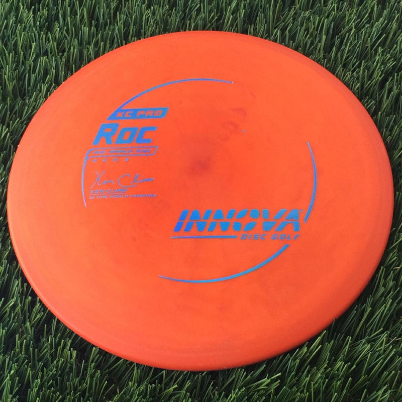 Innova Pro KC Roc with Ken Climo 12 Time World Champion Burst Logo Stamp - 180g Orange