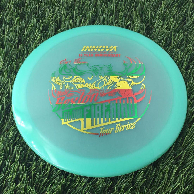 Innova Proto Glow Champion Firebird with Nate Sexton "Sexybird" 10 Year Anniversary Tour Series Stamp - 175g - Translucent Green