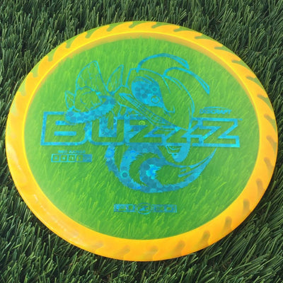 Discraft Elite Z FuZed Line with Saw Pattern Buzzz with Big Bee with Saw Blade - "Buzzzsaw" Stamp - 180g - Translucent Orange