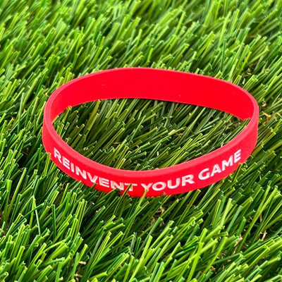 Reinvent Your Game' Wristband