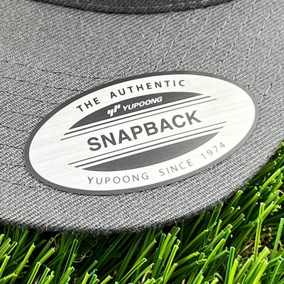 Yupoong / Kastaplast The Authentic Snapback Clothback Hat